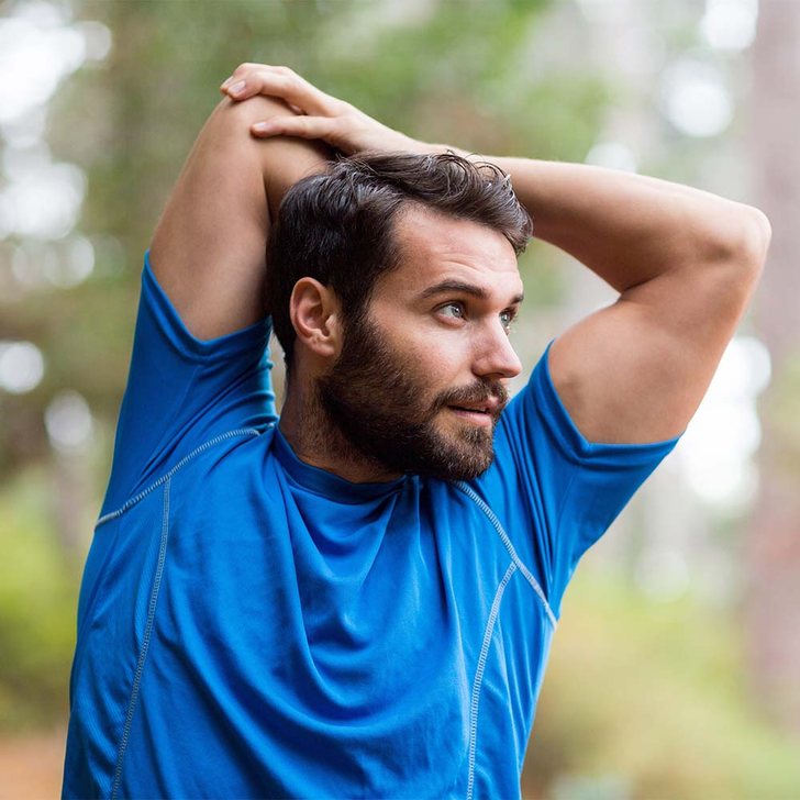 Smiling man &mdash; low testosterone treatment at Evolved Medical