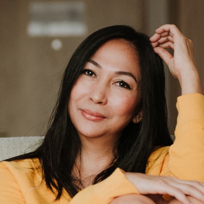 Portrait of a smiling woman with long dark hair